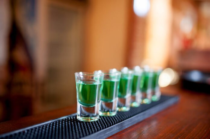 alcoholic shots of different drinks at a party in a nightclub on